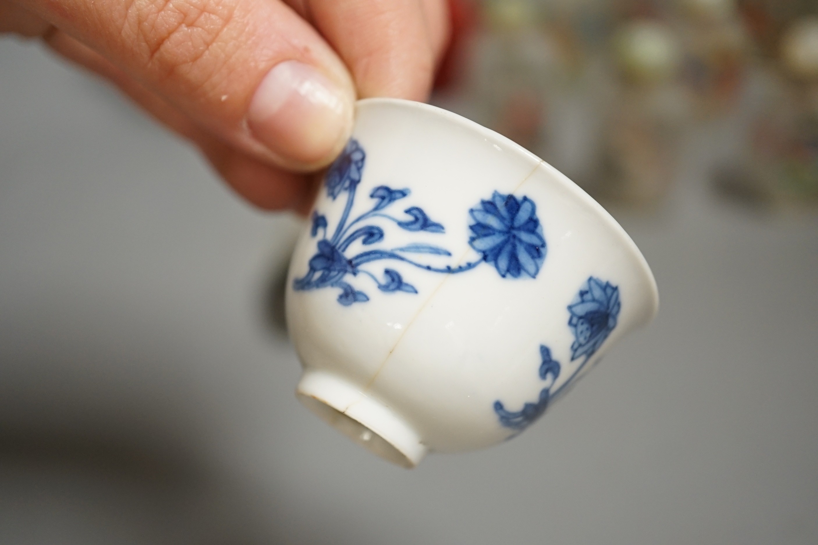 A collection of 20th century Chinese export reverse painted snuff bottles with associated blue and white porcelain examples, some 19th century